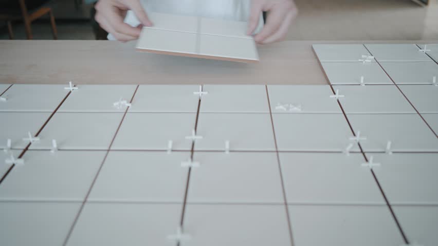 Plastic Tile Stock Footage, How To Use Spacers For Ceramic Tile