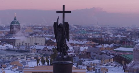 View  of  Saint Petersburg city through the Angel on top of Alexander Column in the Palace Square. Russia.