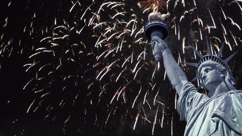 Seamless loop - Statue of liberty, night sky with fireworks - New year, national holiday celebration concept in New Year, US - HD video