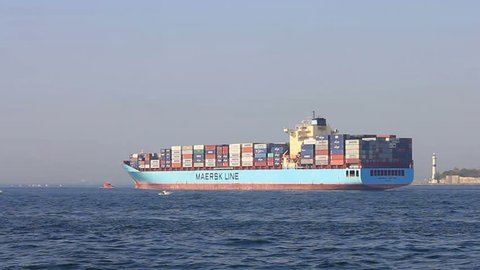 ISTANBUL - MAY 7: Container Ship, Maersk Kinloss (IMO: 9333022, UK) sails into open sea on May 7, 2012 in Istanbul. Some 50,000 ships pass through the Turkish Straits every year.
