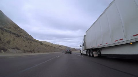 Denver, Colorado, USA-February 11, 2017. Time-lapse. POV. Driving on the mountain highway on winter morning.