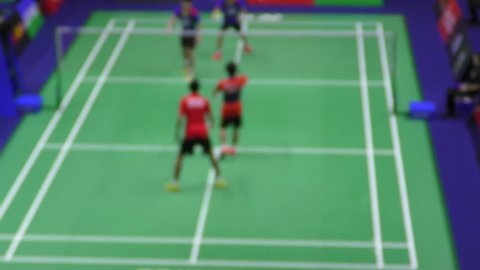 Badminton players in action - changing shuttlecock strategy