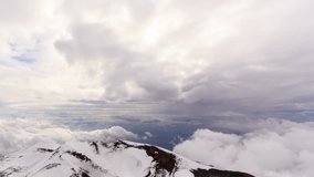 One of the extinct craters of Mount Etna on the background of clouds timelapse.