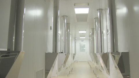 Long bright corridor in scientific laboratory building.