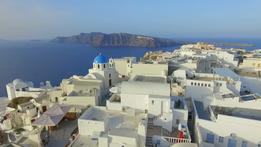 Aerial view flying over city of Oia on Santorini Greece HD | Shutterstock HD Video #24323948