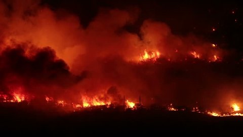 FOUNTAIN GREEN, UTAH - JUN 23: The Sanpete forest fire burns out of control during the night in Wood Hollow Canyon on June 23, 2012 in Fountain Green, Utah. The fire had burned over 6,000 acres and caused more than 500 homes to be evacuated as of June 25.