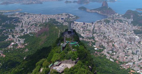 RIO DE JANEIRO, BRAZIL - FEBRUARY 2017: Aerial overhead shot of Christ the Redeemer Statue on the top of Corcovado Hill. Monument is famous landmark in Rio and symbol of Christianity across the world