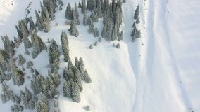 Aerial view footage adventure at mountain, winter nature. Snowboarding and ski backcountry area landscape. 4K video by drone