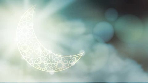 Glittering ornamental moon with moving clouds bokeh effect.  HD graphic animation for muslim holiday holly month Ramadan Kareem.