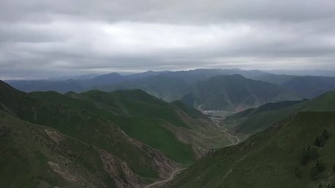 Timelapse of beautiful mountain landscape and clouds in Xiahe, China