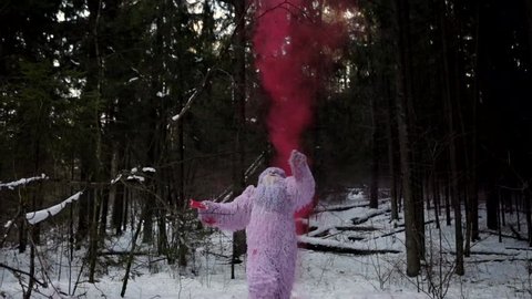 Yeti fairy tale character in winter forest. Outdoor fantasy slow motion footage.