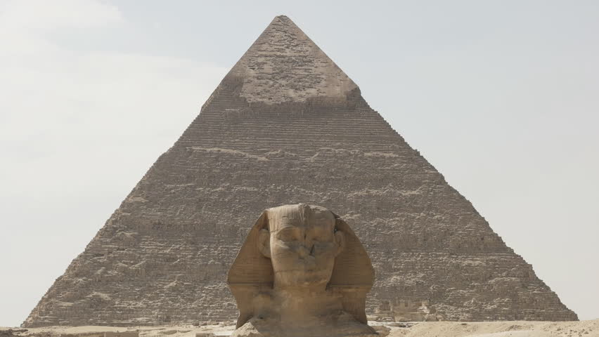 close up of the sphinx with the pyramid of khafre in the background at giza near cairo, egypt