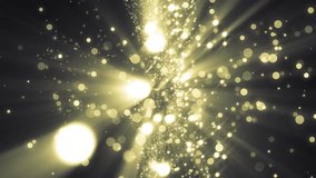 Abstract golden motion particles. Animation gold background with rays and sparkles stars on black background. VJ Seamless loop.
