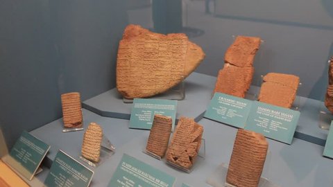 ISTANBUL, TURKEY, MARCH 22, 2016: Assyrian text on a clay tablet in Istanbul Archaeological Museum. Istanbul Archaeological Museum is located in Eminonu district of Istanbul, Turkey.