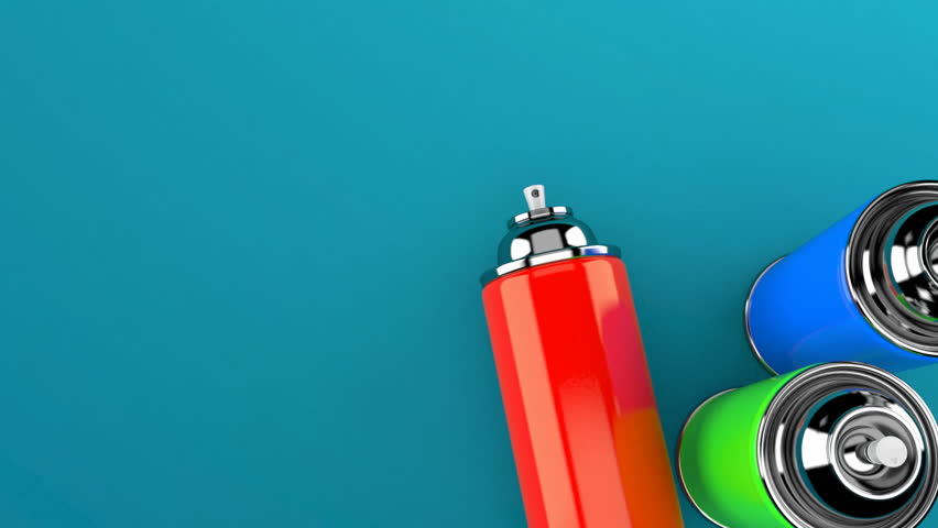 Spray cans on blue background