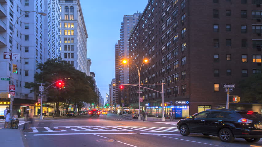 NEW YORK CITY - JUN 15: Timelapse of Traffic at sunset passing by on Broadway on