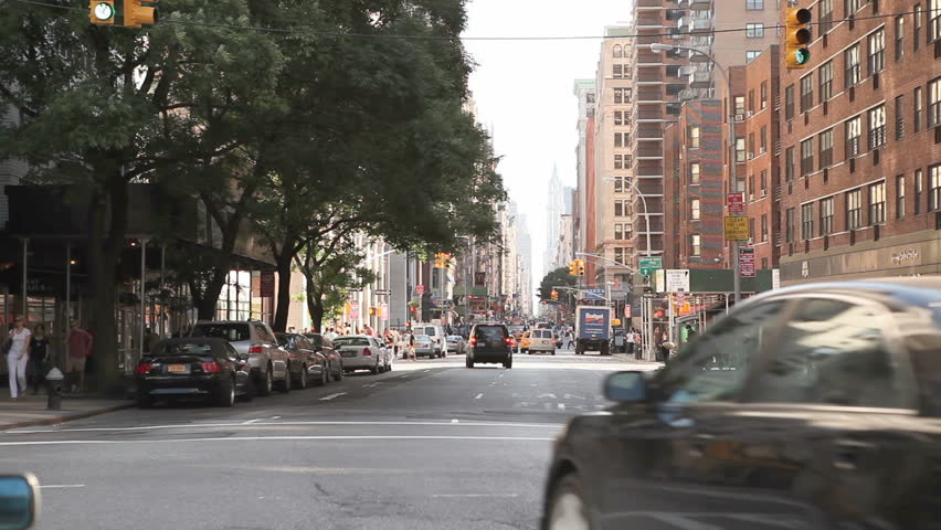 NEW YORK CITY - JUN 15: Timelapse of Car Traffic passing by on Broadway on June