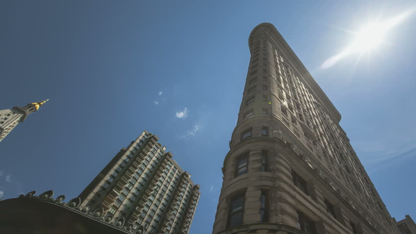 NEW YORK CITY - JUN 15: Timelapse of the Flatiron Building with clouds in the