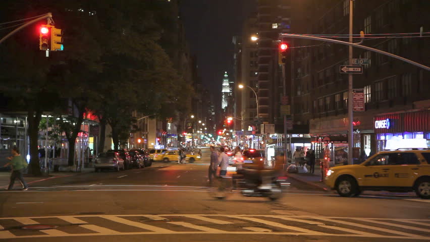 NEW YORK CITY  - JUN 15: Traffic at night passing by on Broadway on June 15,