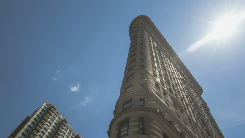 NEW YORK CITY - JUN 15: Timelapse of the Flatiron Building with clouds in the