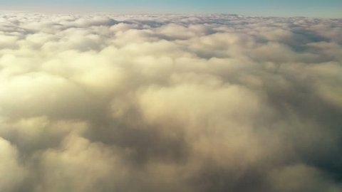 Footage of some clouds, from above, moving.