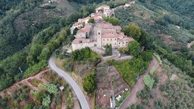 Aerial shot of a small town on the hill in Tuscany, Italy, 4K
