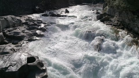 Drone Flying Over Stunning River Waterfall with White Water Rapids in Ultra Real 4K Nature Shot