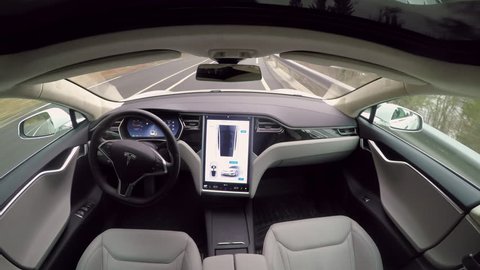 AUTONOMOUS TESLA CAR, FEBRUARY 2016:  Absolutely autonomous self-driving Tesla Model S autopilot and trully driverless car with empty seat and no driver. Next gen ultrasonic sensors, cameras and radar