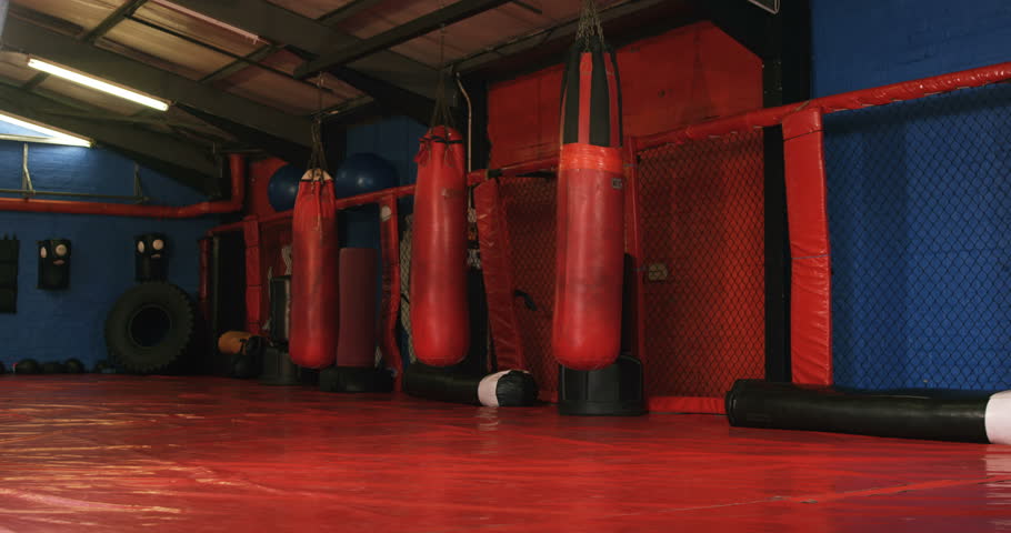 Man practicing karate in fitness studio