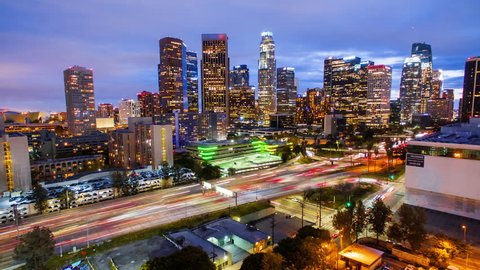 4K Spectacular Aerolapse ( timelapse / hyperlapse ) view of the big city skyscrapers and rush hour traffic on 110 freeway in Downtown, Los Angeles