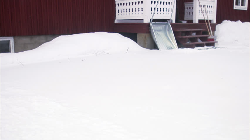 A man clearing away the snow