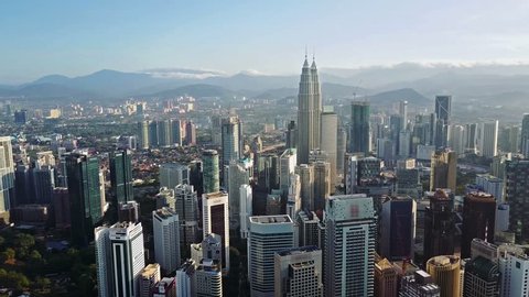 Aerial view of kuala lumpur cityscape. Drone video of asian scyscrapers. Blurred all logotypes.