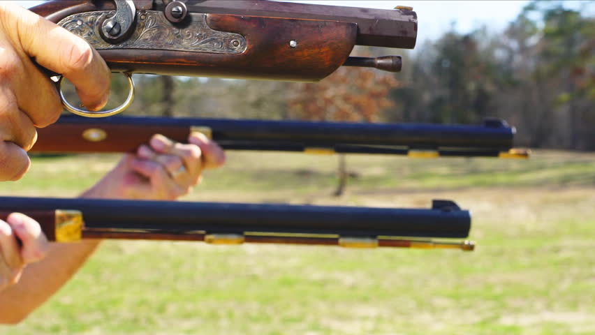 Blackpowder Muzzleloaders firing in slow motion, filmed at 120 fps, slowed to 1/4 natural speed. Period correct for Civil war or Revolutionary war. 18th or 19th century guns.
