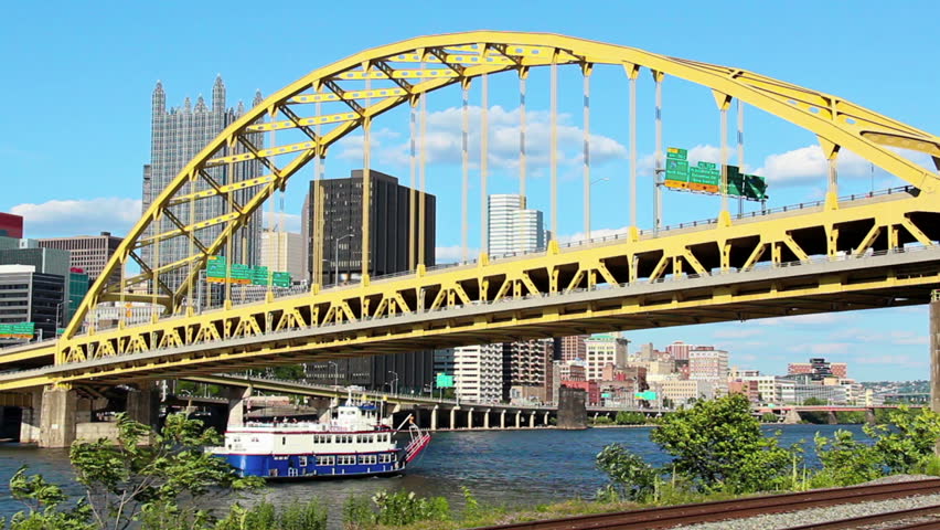 A riverboat passes under the Fort Pitt Bridge in Pittsburgh, PA.