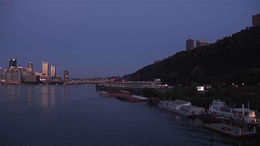 Skyline View of Pittsburgh Point and Three Rivers Aerial 4K at night during blue hour