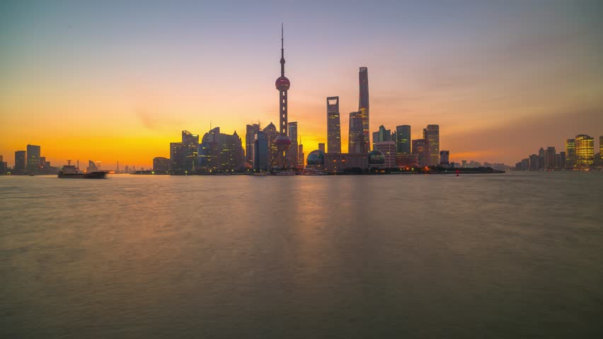 4K Timelapse of Shanghai Pudong viewed from the Bund Shanghai from Night to Day and Huangpu River in Shanghai, China