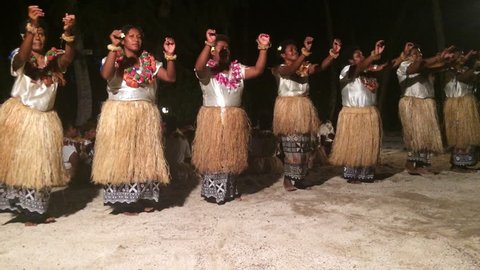 Fijian women dancing a traditional female dance Meke the fan dance. Real people. Copy space