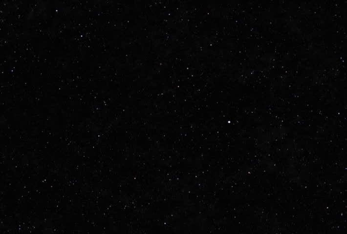Slow tilt-up to view a black sky with small scattered stars | Shutterstock HD Video #24453920