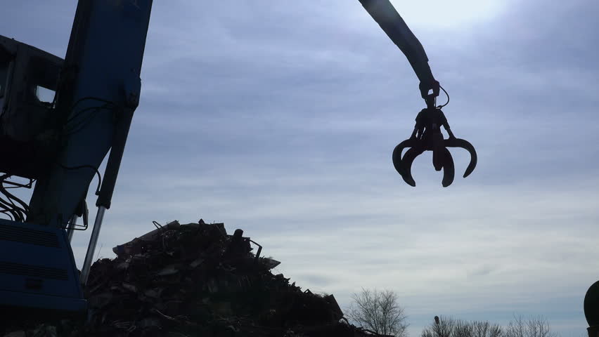 Scrap metal recycling plant and crane Royalty-Free Stock Footage #24460058