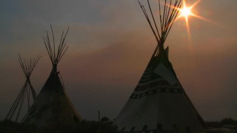 Teepees at sunset