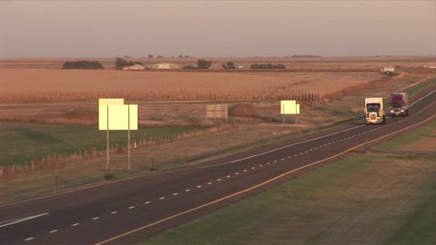 View of vehicles passing at magic hour in Wyoming United States