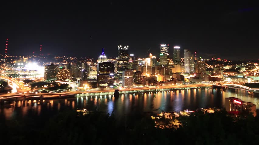 Downtown Pittsburgh Illuminated Skyline At Night Scenic Time Lapse 4K 