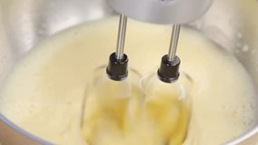 Sugar being stirred into egg cream