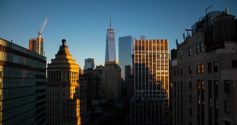 Manhattan, New York City, USA - sunny view over Financial District with One World Trade Center at sunny day with moving shadows over the skyscrapers - Timelapse without motion - 01/2016