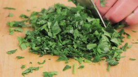Parsley leaves being chopped