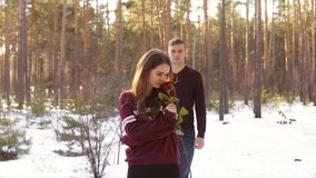 Happy couple in winter forest.Full hd video