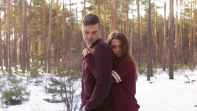 Happy couple in winter forest.Full hd video