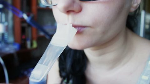 young girl inhales medication through a nebulizer asthma, bronchospasm, bronchitis, cough.Full HD 1920 x 1080, 29,97 fps