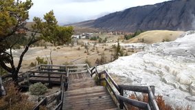 Walking down from the top of mammoth hot springs, in Yellowstone national park, in Wyoming, United states of america.