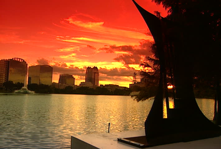 ORLANDO - Circa 2002: Sunset on Lake Eola and the Orlando skyline in 2002.
